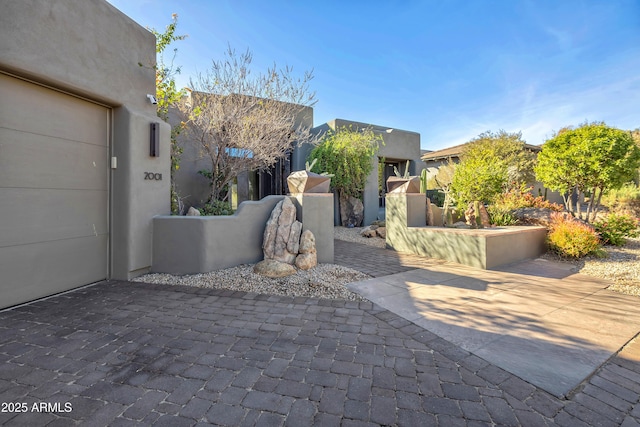 exterior space with a garage