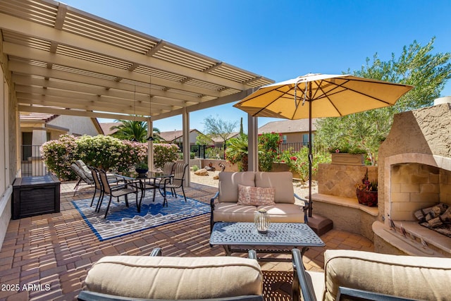 view of patio featuring fence, a pergola, an outdoor living space with a fireplace, and outdoor dining area