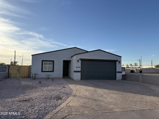 1238 S 14th St, Phoenix, AZ 85034 - view of front of house featuring a garage