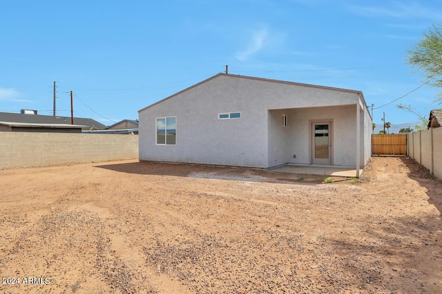 rear view of property with a patio