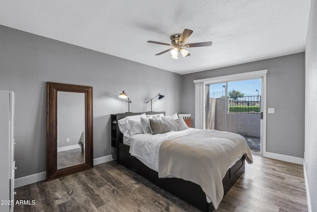 4502 W Continental Dr, Glendale, AZ 85308 - bedroom featuring access to outside, wood finished floors, baseboards, ceiling fan, and a textured ceiling