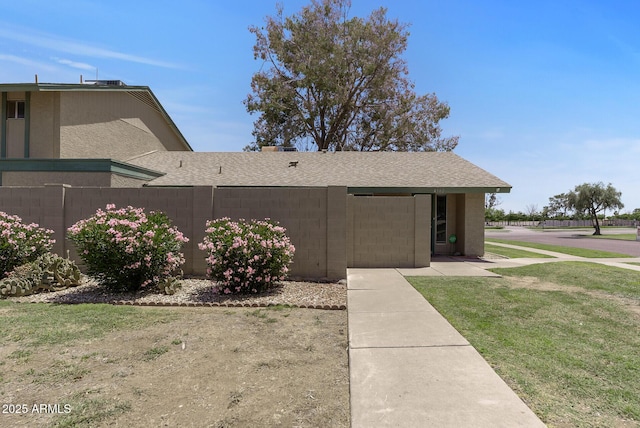 4502 W Continental Dr, Glendale, AZ 85308 - view of front of home with roof with shingles and stucco siding