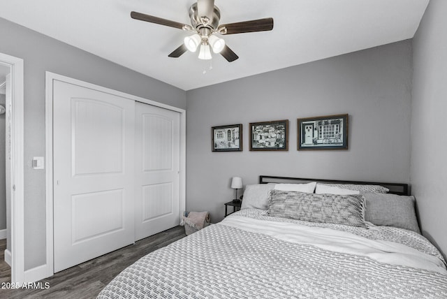 4502 W Continental Dr, Glendale, AZ 85308 - bedroom featuring dark wood-style flooring, a closet, ceiling fan, and baseboards