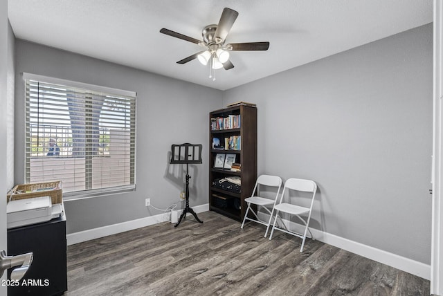 4502 W Continental Dr, Glendale, AZ 85308 - living area with dark wood-style floors, baseboards, and ceiling fan