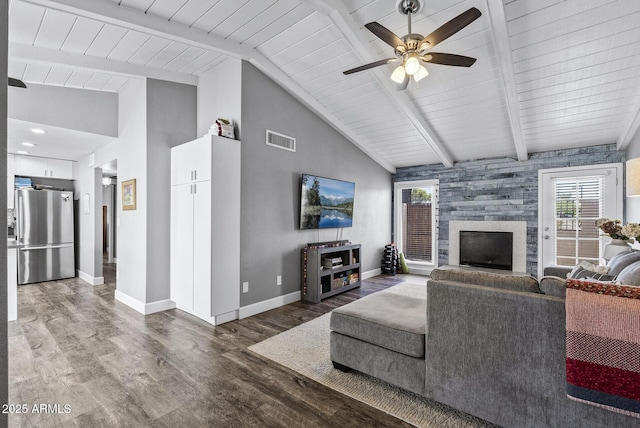 4502 W Continental Dr, Glendale, AZ 85308 - living area with wood finished floors, baseboards, ceiling fan, wood ceiling, and a large fireplace