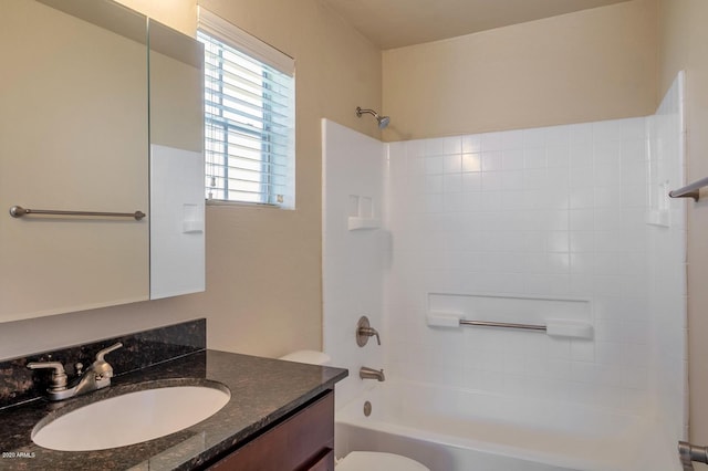 full bathroom featuring toilet, vanity, and bathtub / shower combination