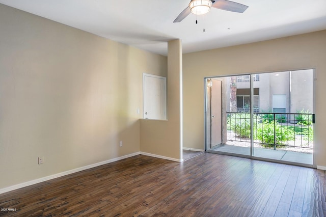 unfurnished room with ceiling fan and dark hardwood / wood-style flooring