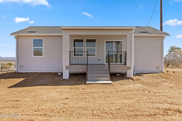 20175 E Cedar Canyon Dr, Mayer, AZ 86333 - rear view of house featuring a porch and a shingled roof
