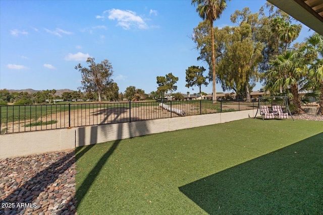 view of yard featuring fence