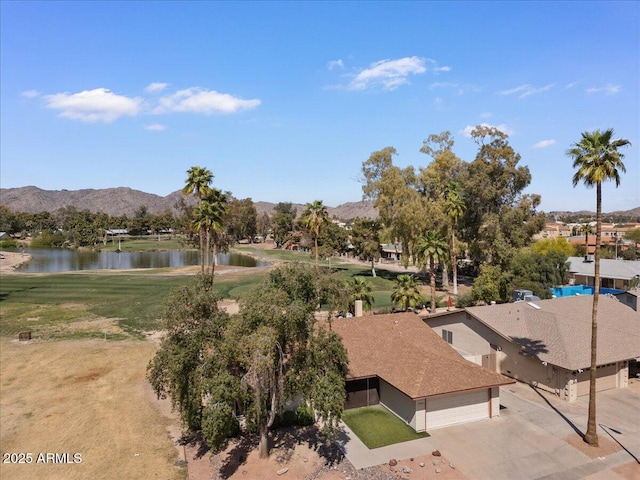 bird's eye view with a water and mountain view