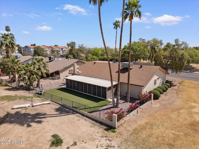birds eye view of property with a residential view