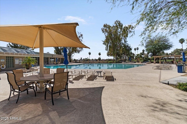 community pool with a patio