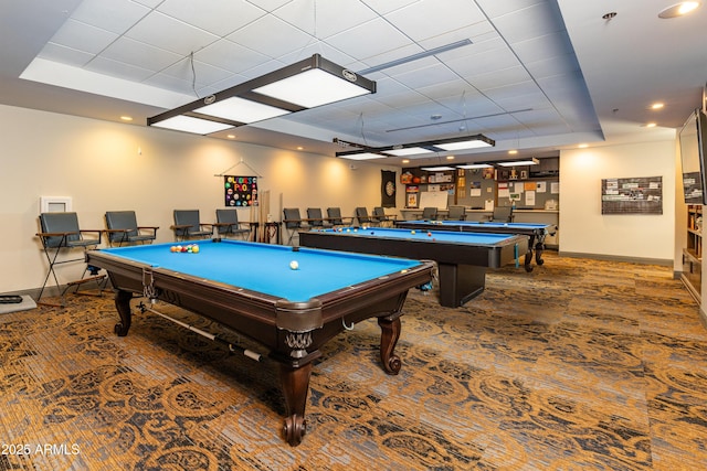 recreation room with pool table, carpet flooring, a tray ceiling, and baseboards