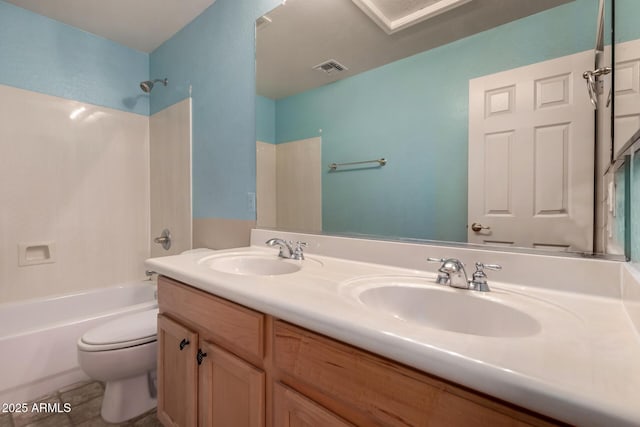 full bath with a sink, washtub / shower combination, toilet, and visible vents