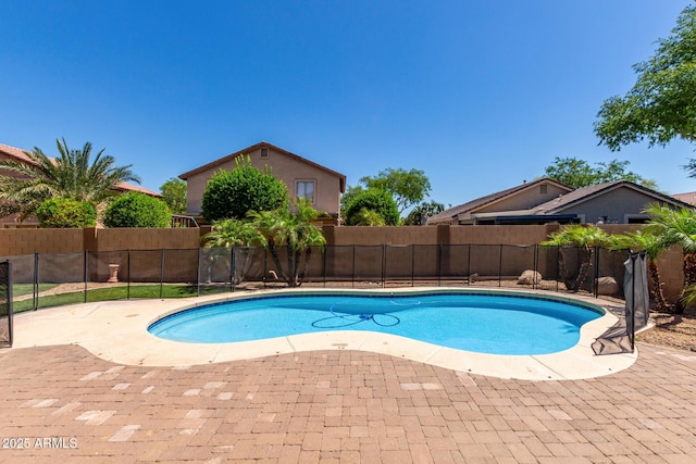 view of pool featuring a fenced in pool, fence, and a patio
