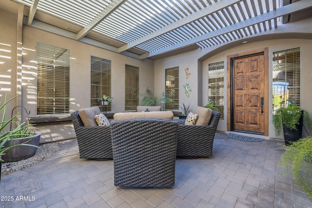 view of patio / terrace featuring an outdoor living space and a pergola