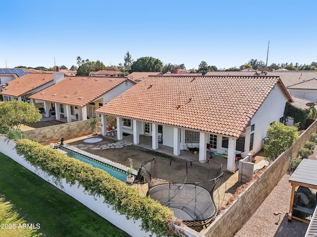 rear view of house with a patio area