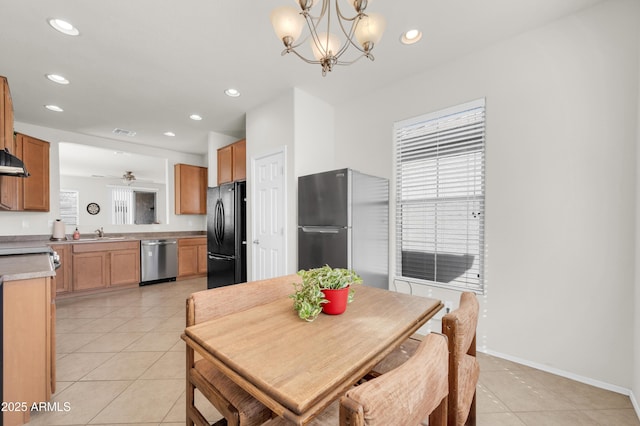 dining area featuring light tile patterned floors, baseboards, visible vents, and recessed lighting