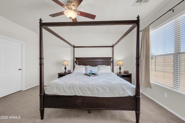 bedroom with ceiling fan, carpet, visible vents, and baseboards