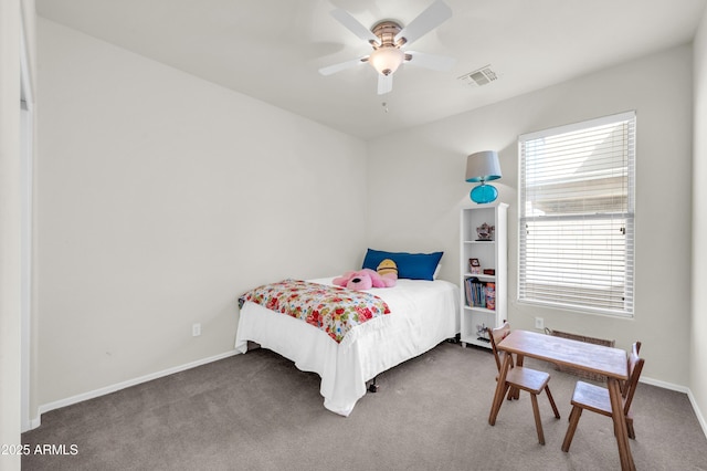 carpeted bedroom with baseboards, visible vents, and ceiling fan