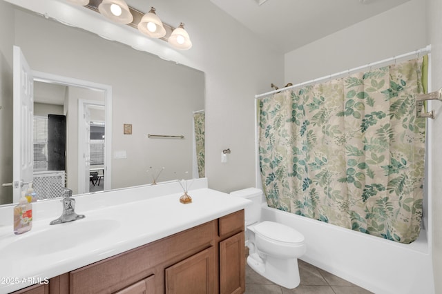 bathroom featuring vanity, tile patterned flooring, toilet, and shower / bathtub combination with curtain