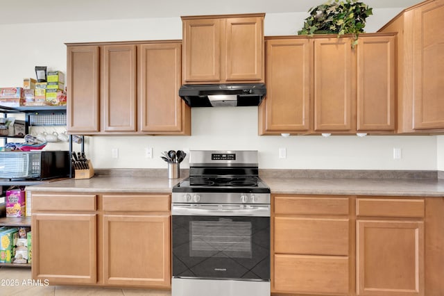 kitchen with light countertops, stainless steel range with electric cooktop, under cabinet range hood, light brown cabinets, and black microwave