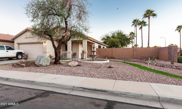 single story home with a garage