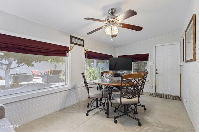 6263 E Duncan St, Mesa, AZ 85205 - tiled dining room with a ceiling fan and vaulted ceiling