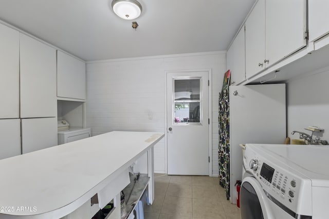 6263 E Duncan St, Mesa, AZ 85205 - washroom with cabinet space, washer and dryer, and light tile patterned floors