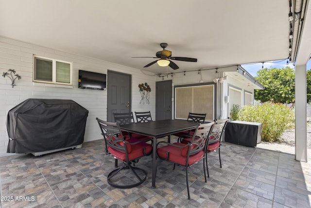 6263 E Duncan St, Mesa, AZ 85205 - view of patio with a grill, a ceiling fan, and outdoor dining space