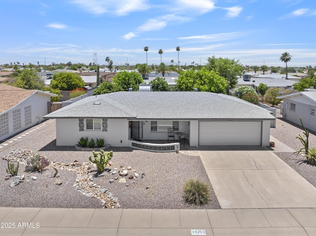 6263 E Duncan St, Mesa, AZ 85205 - ranch-style house with a garage, driveway, and a porch