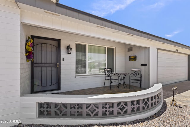 6263 E Duncan St, Mesa, AZ 85205 - entrance to property featuring covered porch and a garage