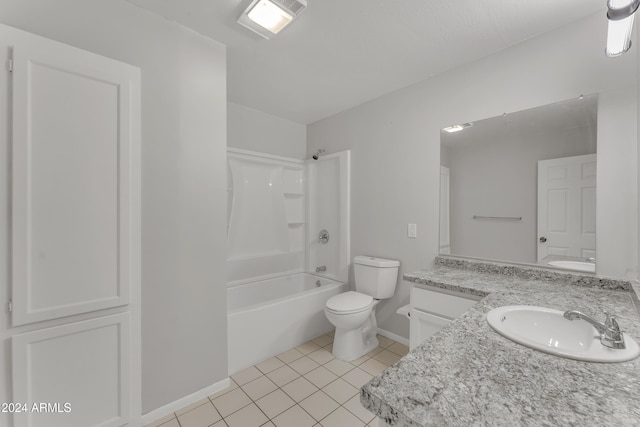 bathroom featuring vanity, baseboards, bathtub / shower combination, tile patterned floors, and toilet