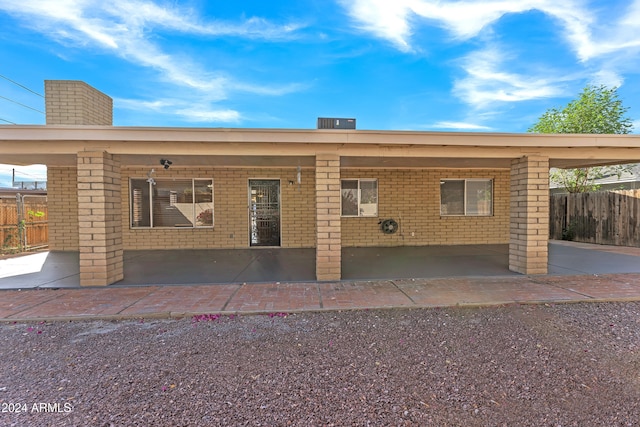 exterior space featuring a carport