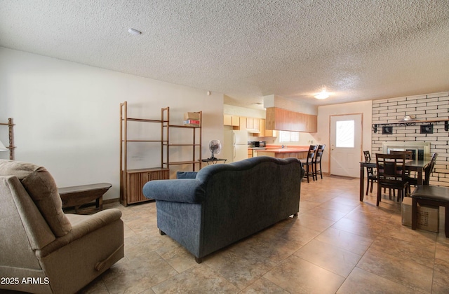 living room with a textured ceiling