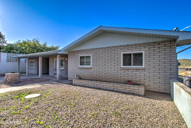 back of property with brick siding