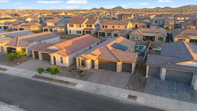 aerial view with a mountain view and a residential view