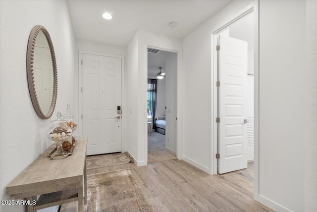 entrance foyer featuring recessed lighting, visible vents, light wood finished floors, and baseboards