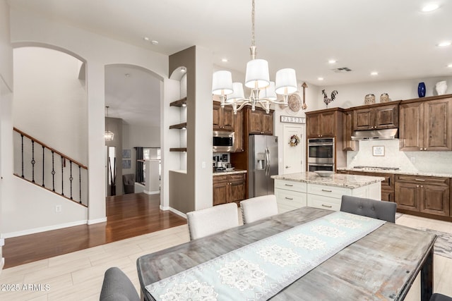 42711 N 45th Dr, Phoenix, AZ 85087 - dining space featuring recessed lighting, stairway, light wood-type flooring, and visible vents