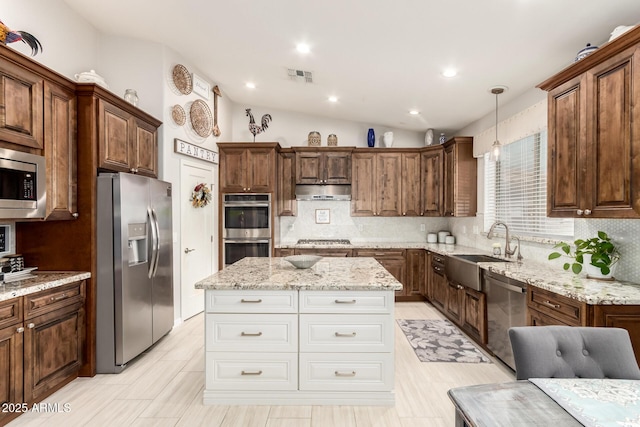 42711 N 45th Dr, Phoenix, AZ 85087 - kitchen with visible vents, a sink, decorative backsplash, and appliances with stainless steel finishes