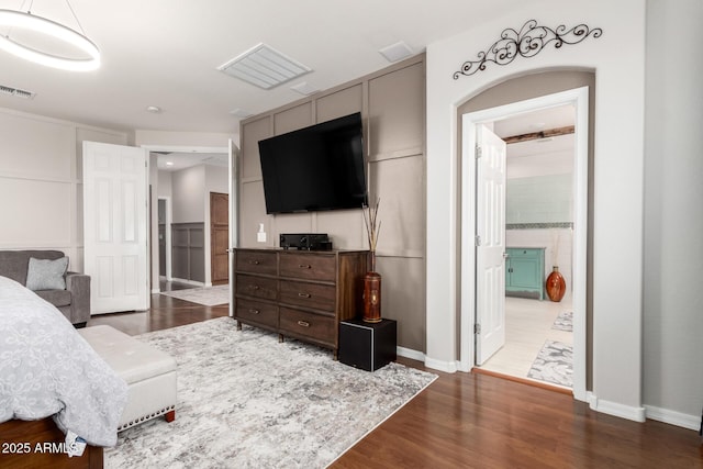 42711 N 45th Dr, Phoenix, AZ 85087 - bedroom with baseboards, dark wood-style flooring, and visible vents