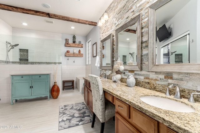 42711 N 45th Dr, Phoenix, AZ 85087 - bathroom with visible vents, tile walls, walk in shower, beam ceiling, and vanity