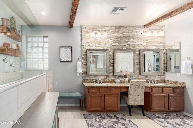 42711 N 45th Dr, Phoenix, AZ 85087 - bathroom with visible vents, vanity, beam ceiling, and wood finished floors