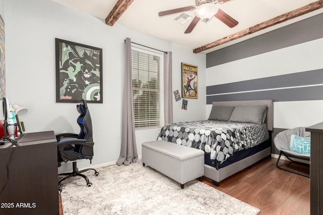 42711 N 45th Dr, Phoenix, AZ 85087 - bedroom featuring beam ceiling, a ceiling fan, baseboards, wood finished floors, and visible vents