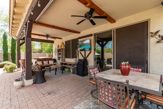 42711 N 45th Dr, Phoenix, AZ 85087 - view of patio / terrace with fence, outdoor dining area, ceiling fan, and an outdoor living space
