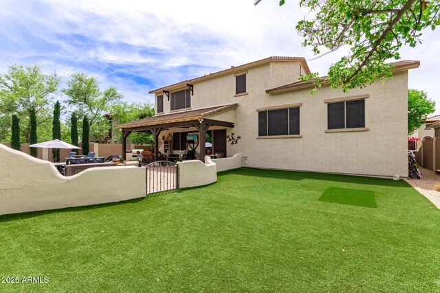 42711 N 45th Dr, Phoenix, AZ 85087 - rear view of house with a patio, a fenced backyard, and a yard