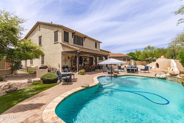 42711 N 45th Dr, Phoenix, AZ 85087 - view of swimming pool featuring fence, a fenced in pool, a patio area, and outdoor lounge area