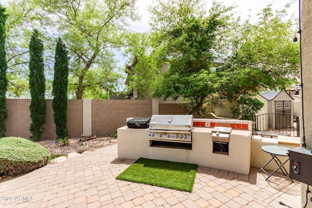42711 N 45th Dr, Phoenix, AZ 85087 - view of patio with fence private yard, area for grilling, and a grill