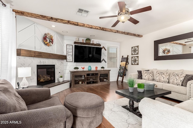 42711 N 45th Dr, Phoenix, AZ 85087 - living area featuring visible vents, wood finished floors, recessed lighting, a ceiling fan, and a premium fireplace