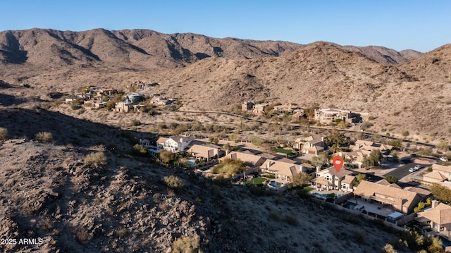 property view of mountains with a residential view